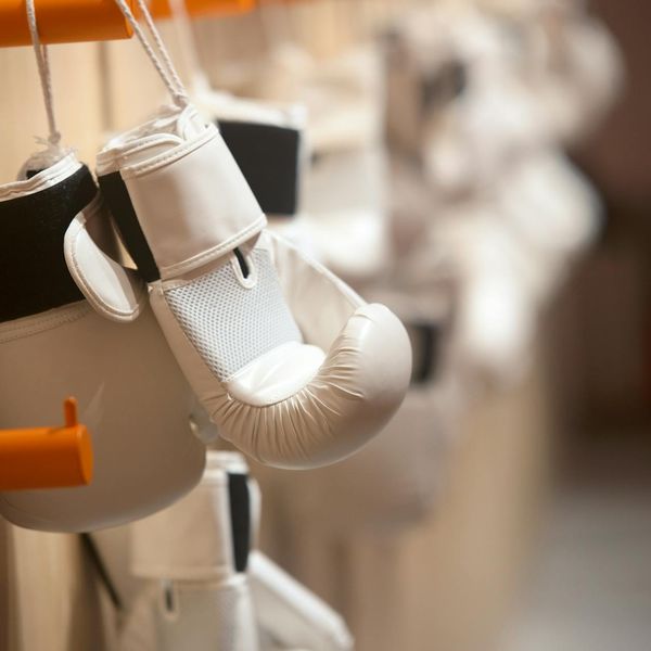 Essential fitness gear neatly arranged on white floor